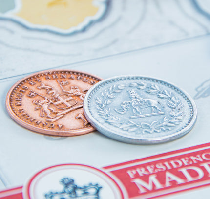 Just two of the four denominations of the John Company Metal Coins