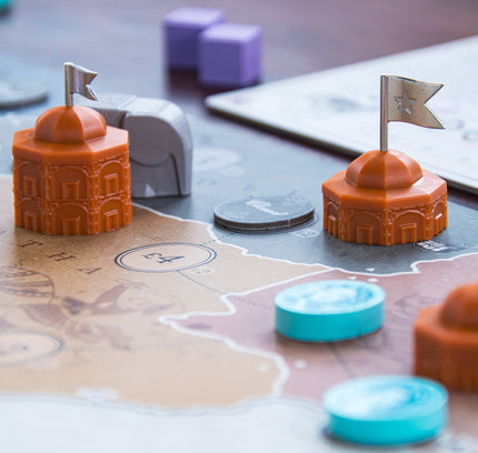 Section of board in John Company: Second Edition featuring officers pieces in India and an elephant meeple.