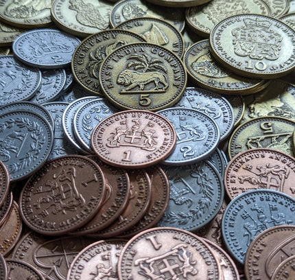 A close-up of the metal coins add-on for John Company: Second Edition