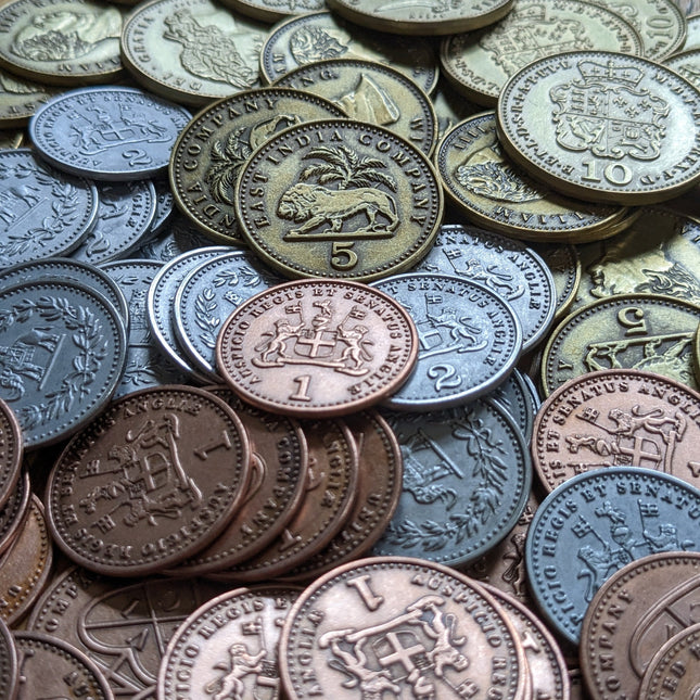 A close-up of the metal coins add-on for John Company: Second Edition