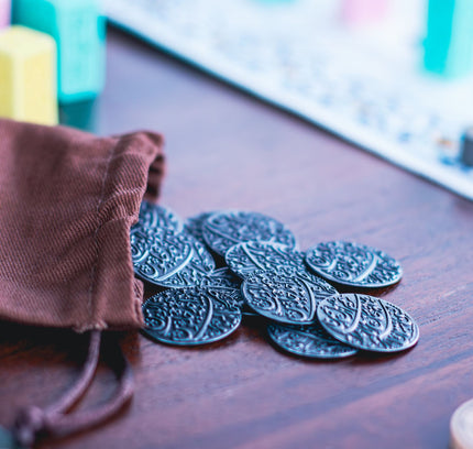 The metal coins and the cloth bag they are included with.